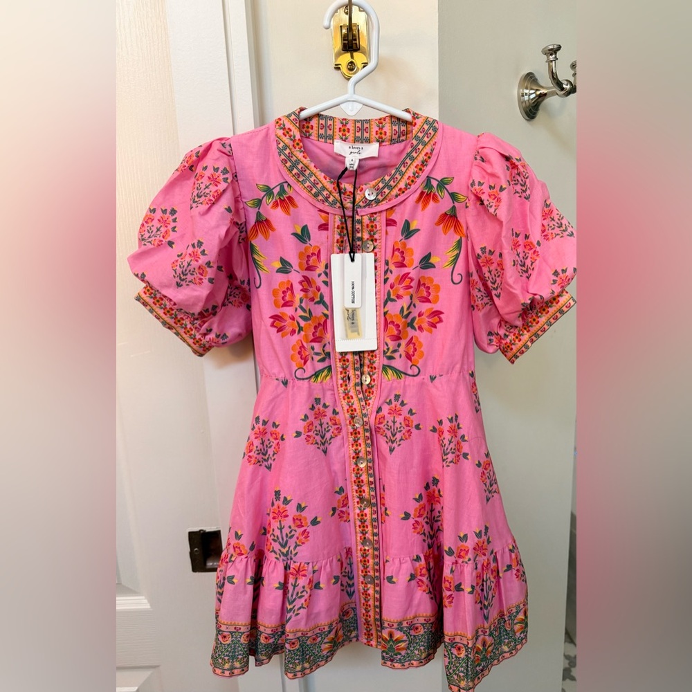 A Loves A Dillard’s Girl’s bubble sleeve floral pink tie front dress